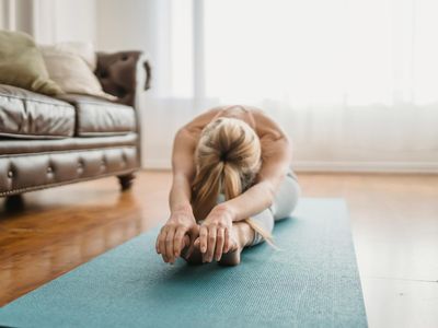 Morning sun rays hitting a workout mat in a room.